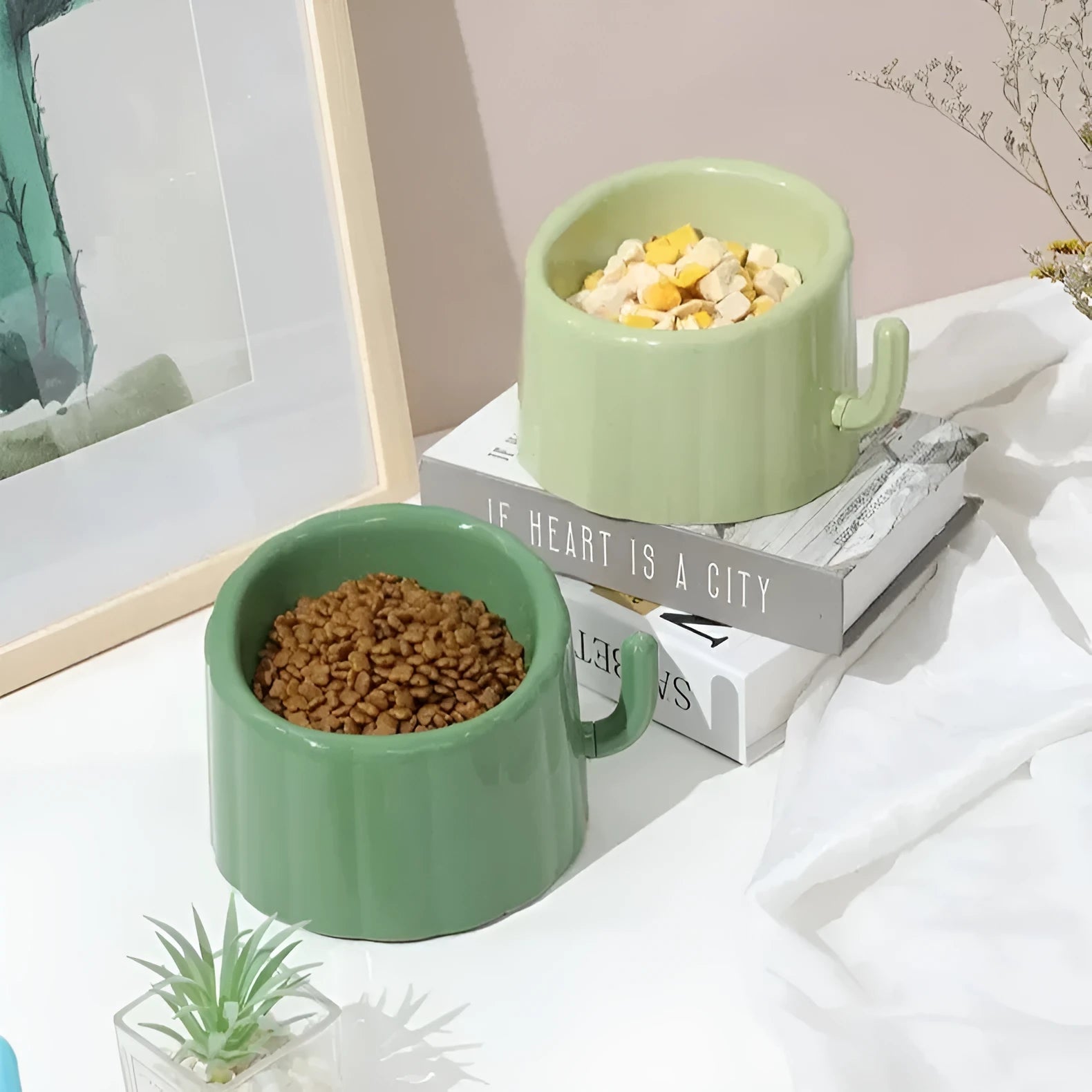 Solid green ceramic cat bowl with cactus pattern, high sides, and anti-slip rubber base ring.