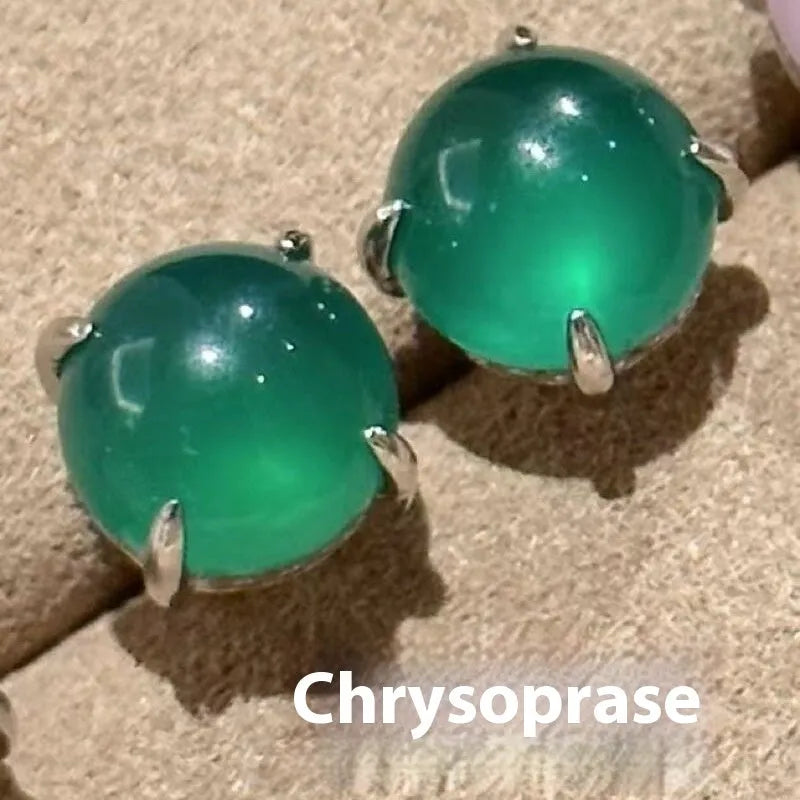 Round egg surface chalcedony stud earrings with four claw settings in emerald green, milk white, or pink purple.