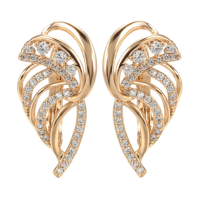 Gold-plated copper women's ear clips with wing design and micro inlaid zircon stones.