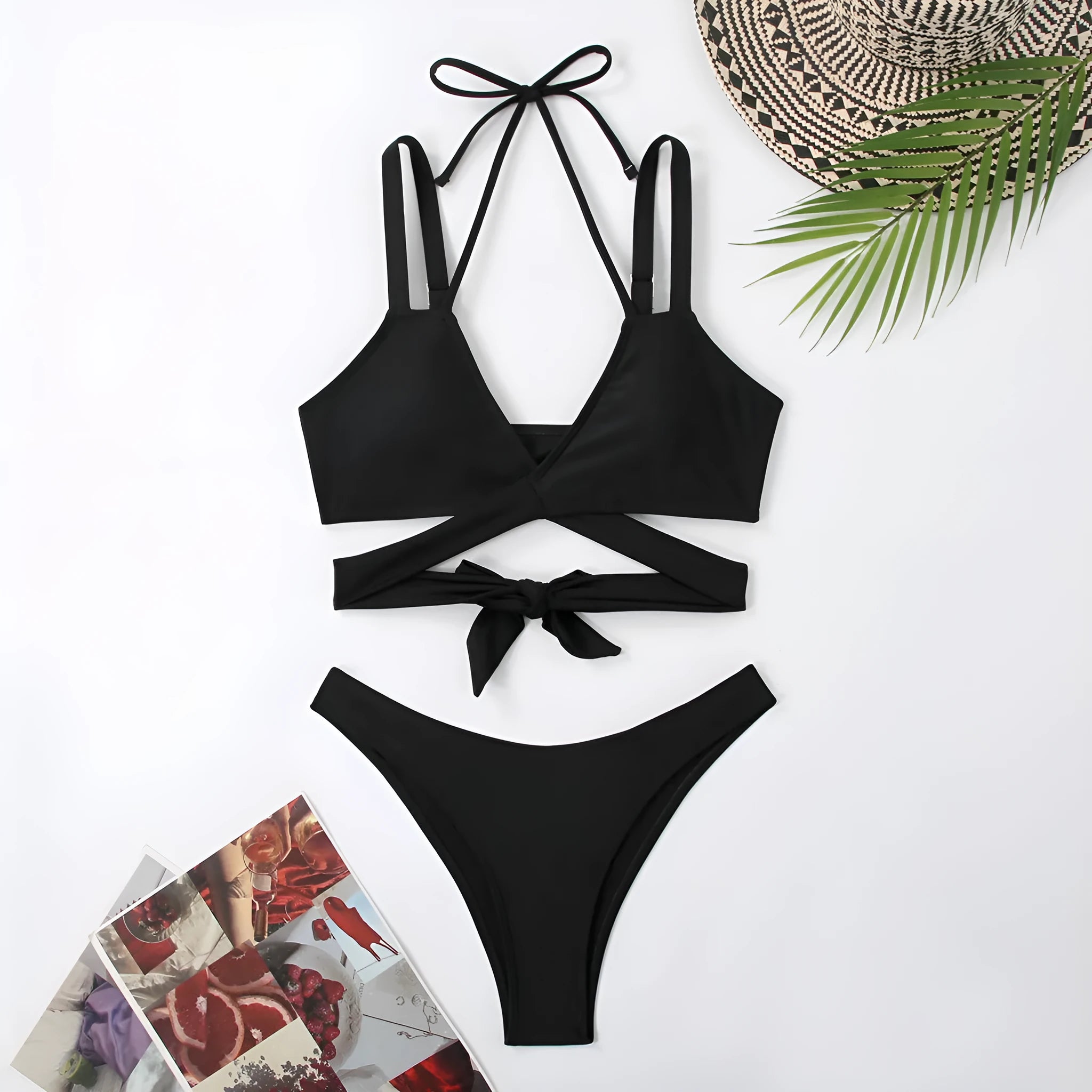 Solid colour strap bikini swimsuit for women on a mannequin, showing the brief cut and sleeveless design.