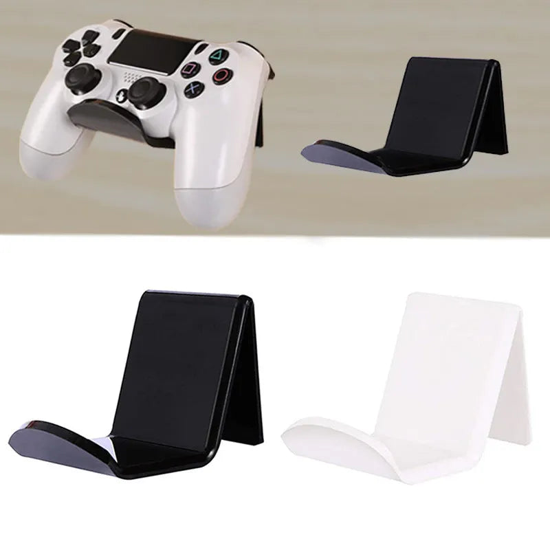 Universal plastic game controller bracket in black colour showing mounting points for installation