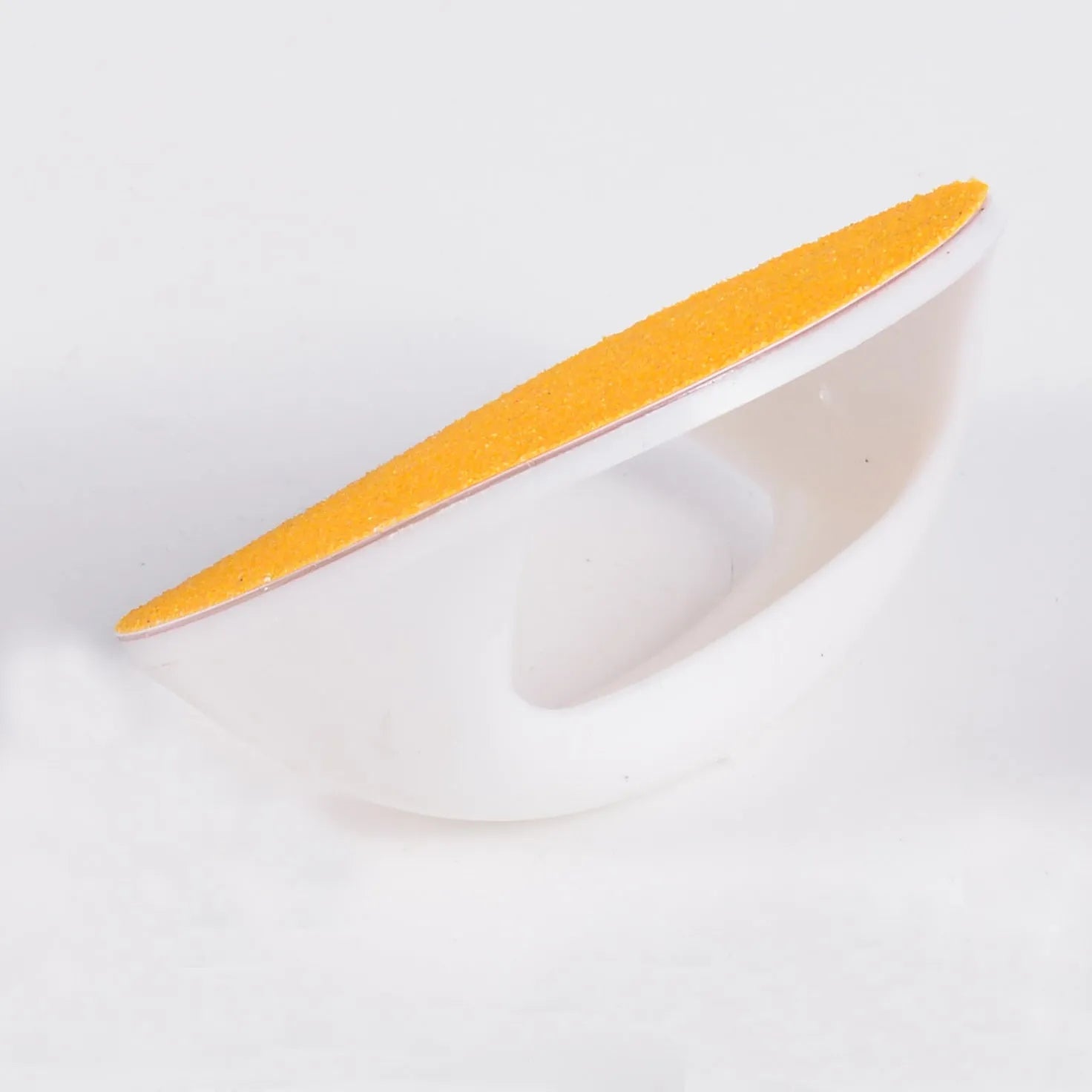 Square dog nail scratch board with ergonomic handle in choice of colours: black, blue, green, or yellow.