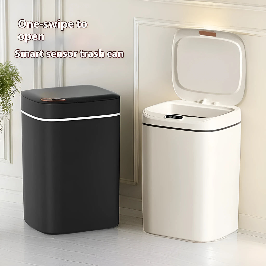 Automatic sensor bin with square white body and open induction lid on a kitchen floor.