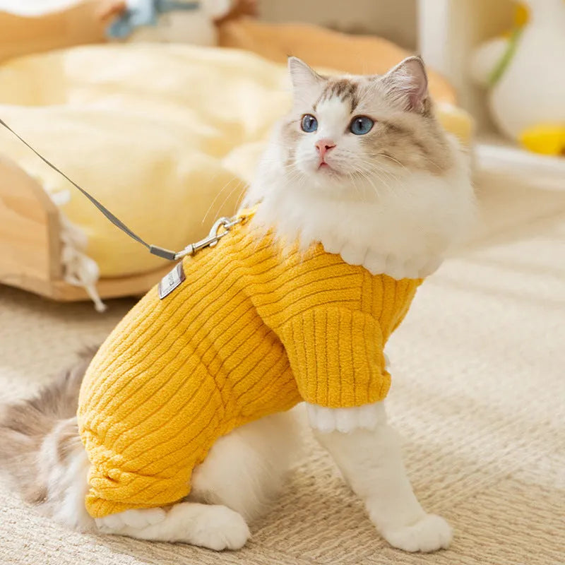Yellow ribbed fleece pet jumpsuit with white ruffled cuffs and leash ring for cats and small dogs.