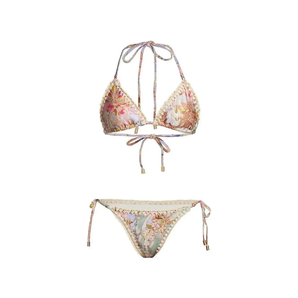 Women's creamy-white floral nylon bikini set with detachable skirt shown in sizes S-XXL