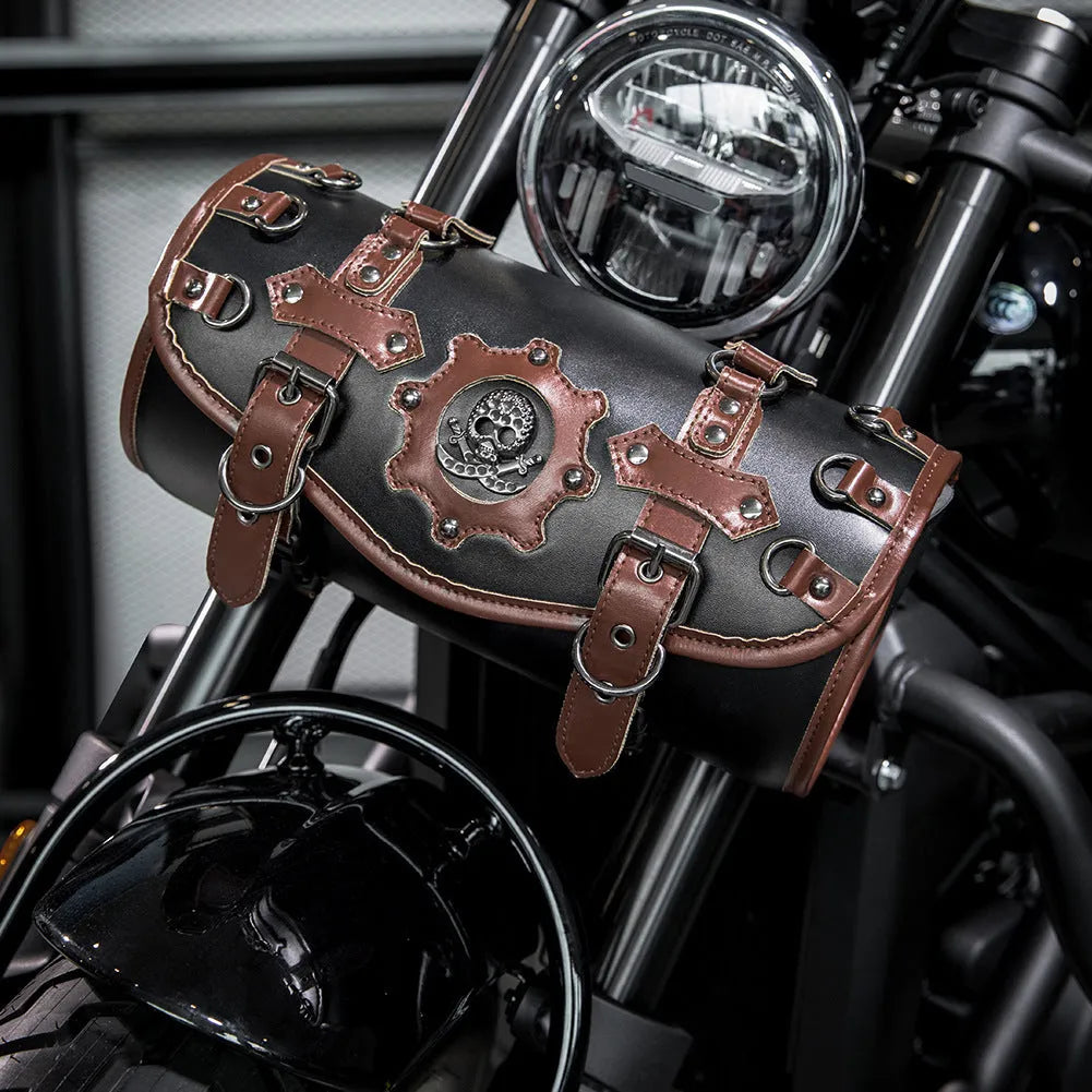 Black punk retro style PU leather motorcycle pannier side bag mounted on a luggage rack.
