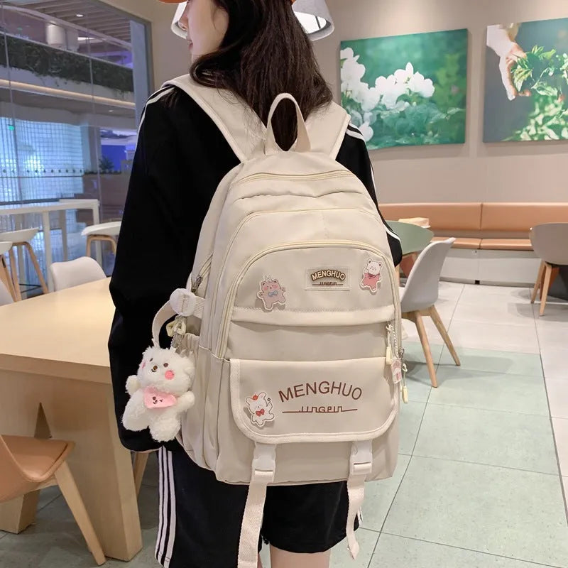 Klein blue large capacity nylon college student backpack with airpillow straps and badge details