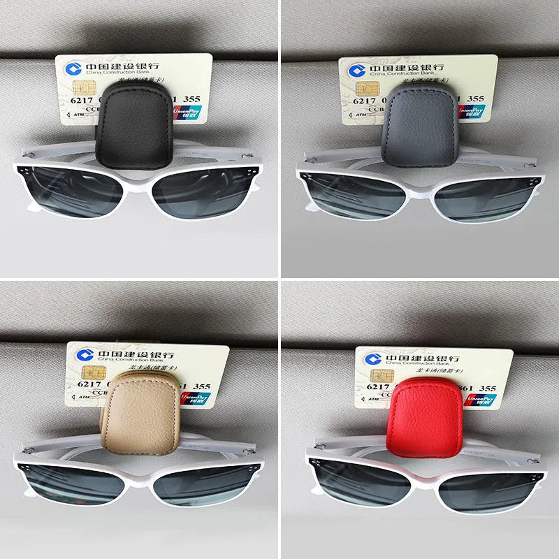 PU leather car sunglasses clip holder mounted on a grey sun visor.