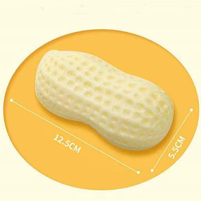 Yellow squeaky peanut-shaped dog chew toy made of durable TPR rubber.