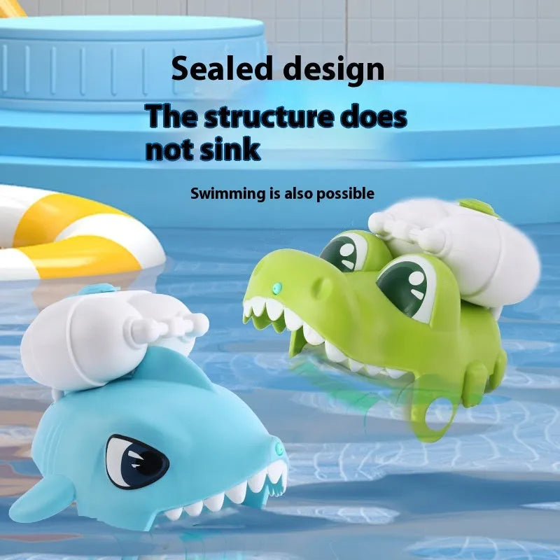 Children's handheld animal water gun toy in clownfish, shark, crocodile or dinosaur design.