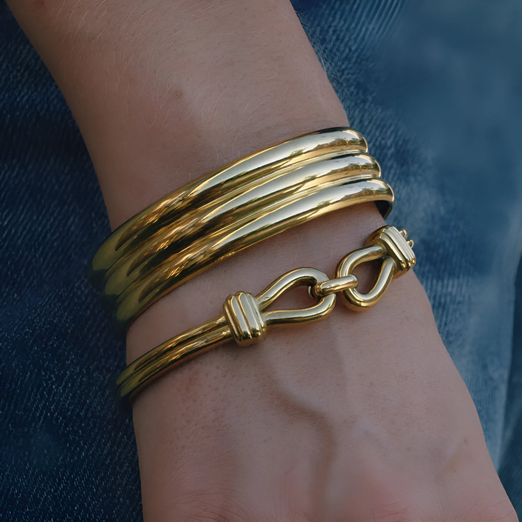 Light luxury stainless steel bracelet with buckle, electroplated finish, connection design, on white background