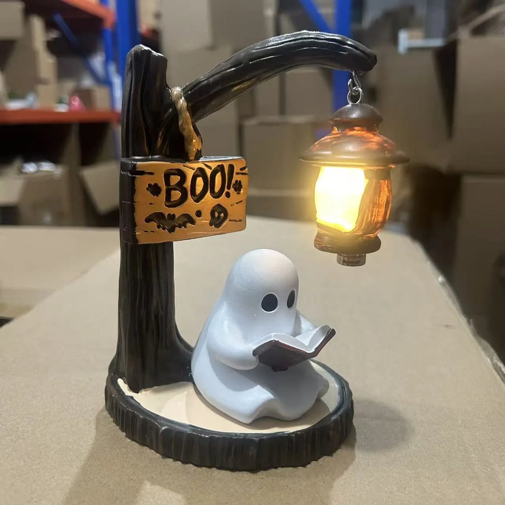 Halloween reading ghost and witch ornament made from resin and plastic in European cartoon style