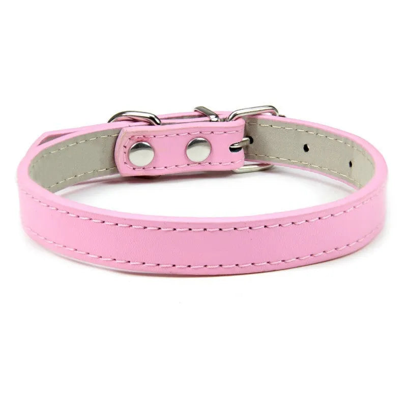 Small and medium dog collar in black PU leather with adjustable buckle, monochrome design