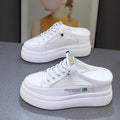 White women's platform shoes with mesh surface and heel-free design