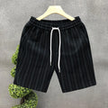Men's black and white striped fleece-lined casual shorts with an elasticated waistband.