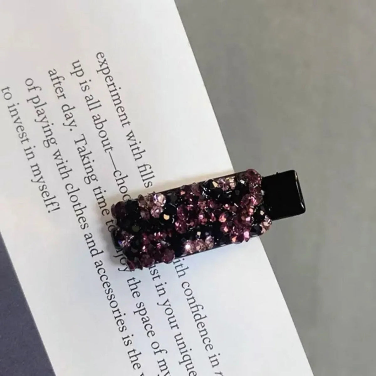 Rhinestone and imitation pearl BB hair clip in Angela red, purple, caramel, and ink blue gray for side bangs.