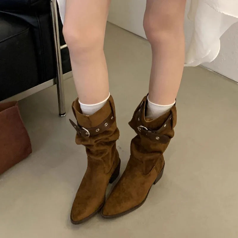 Western cowboy mid-calf boots with chunky heel and pointed toe in black