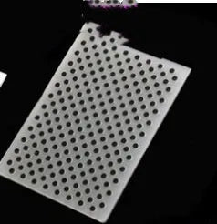 Plastic cake decoration mould showing detailed windmill pattern for fondant and baking