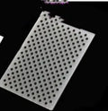 Plastic cake decoration mould showing detailed windmill pattern for fondant and baking