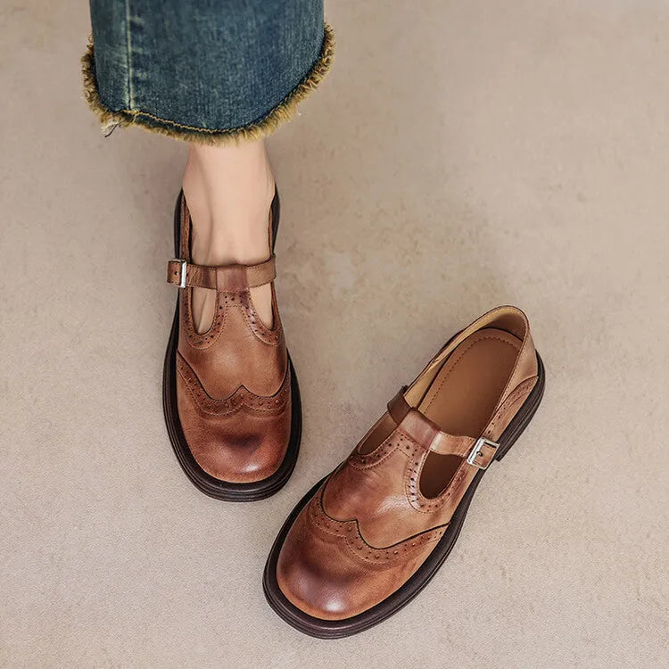 Women's black and brown British style flat shoes with round toe made from sheepskin