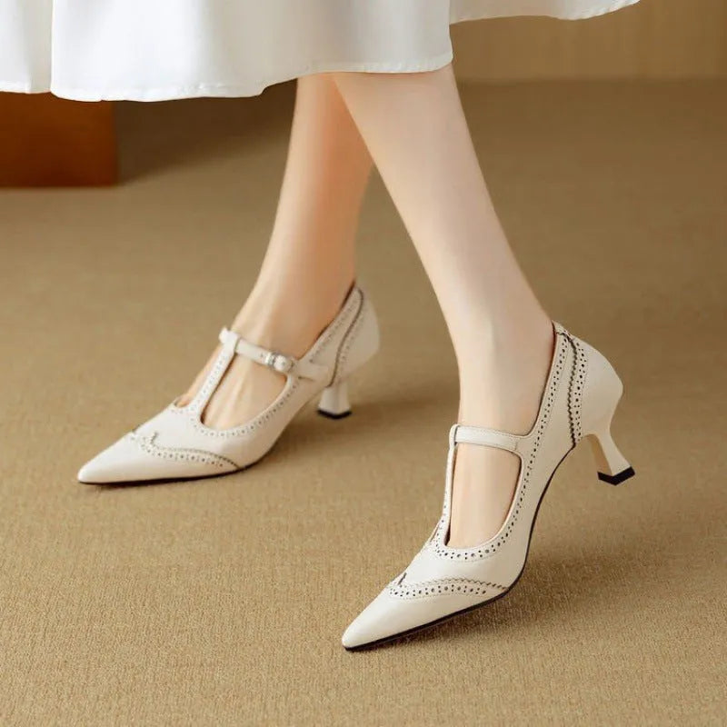 Women's black and white French vintage style stiletto heels with engraved skull pattern design
