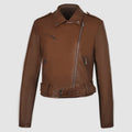 Women's short black PU leather jacket with lapel collar and an adjustable waist belt on a hanger.
