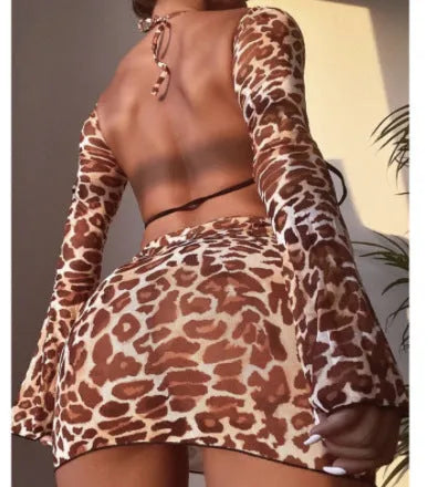 Women's leopard print bikini swimsuit set with matching skirt in split design