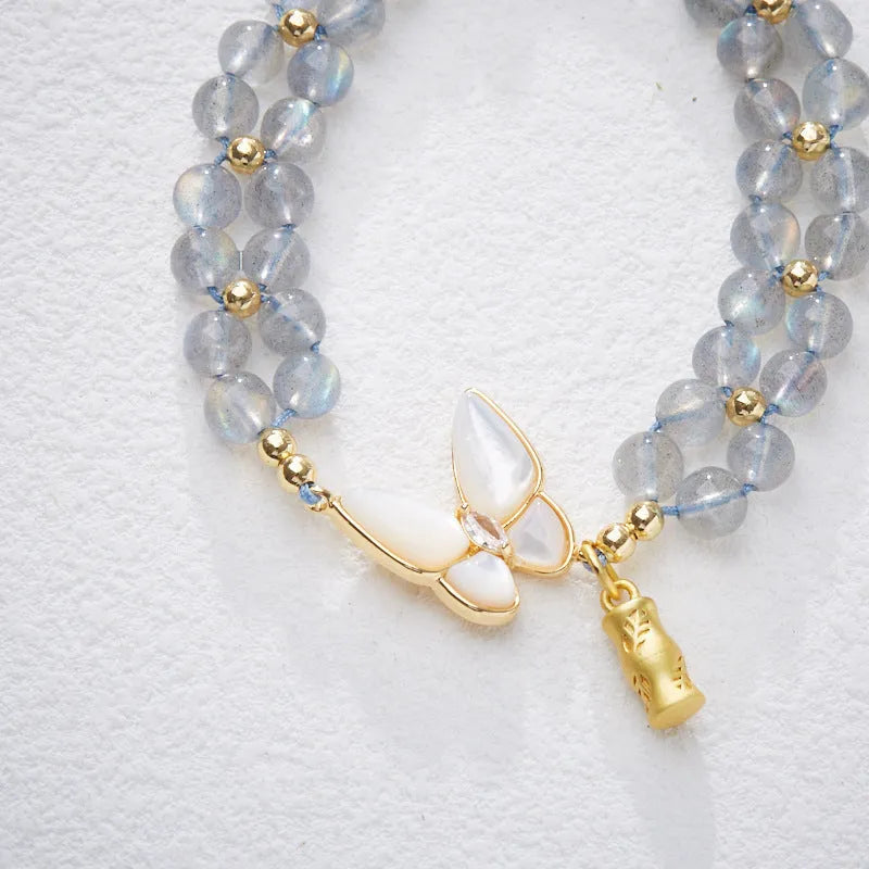 Grey moonstone butterfly charm woven bracelet for women with geometric retro styling