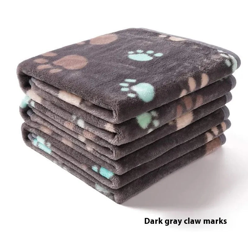 Three flannel coral fleece pet blankets in dark grey, camel, and sky blue stacked together showing size S