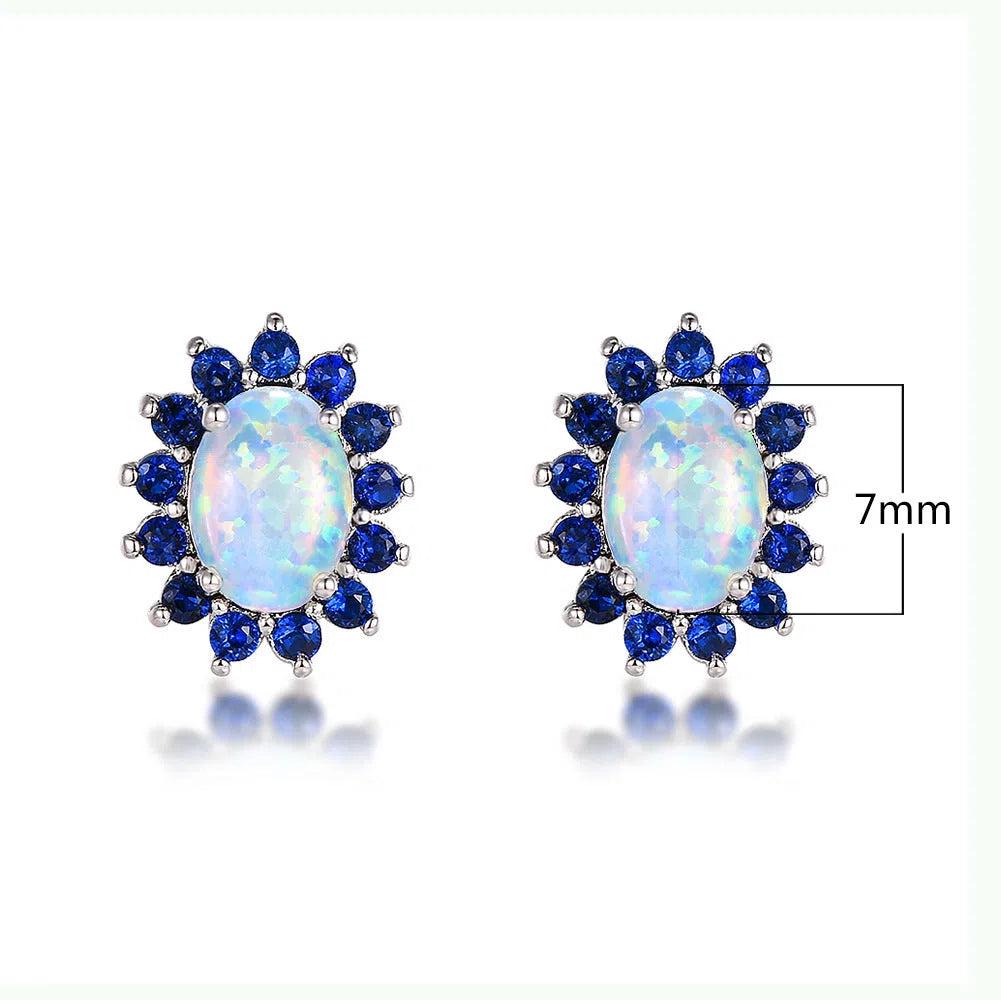 Oval diamond stud earrings in copper with electroplated platinum-tone finish, geometric shape, one pair