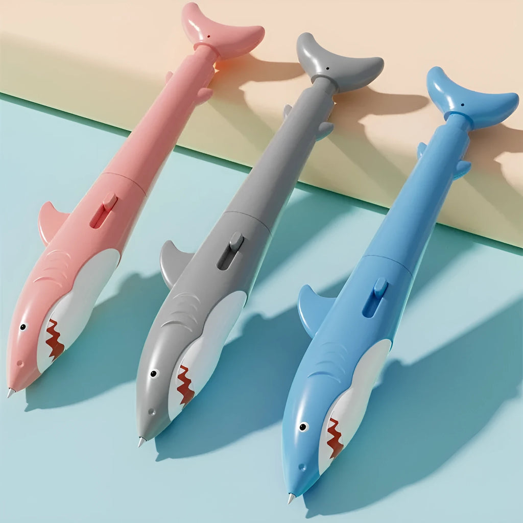 Shark plastic water spray ballpoint pen in blue on white background