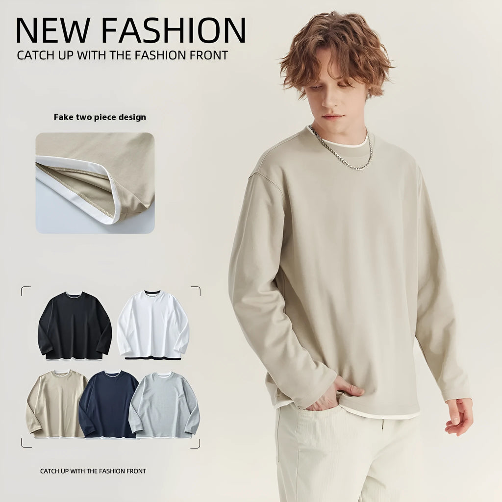 Man wearing a loose-fit long-sleeved cotton blend t-shirt in a solid colour, showing the round neck and casual style.