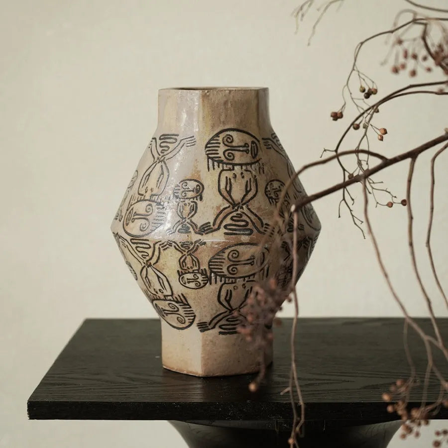 Hand-painted ceramic cylindrical vase with vintage carved art and tribal totem flower design
