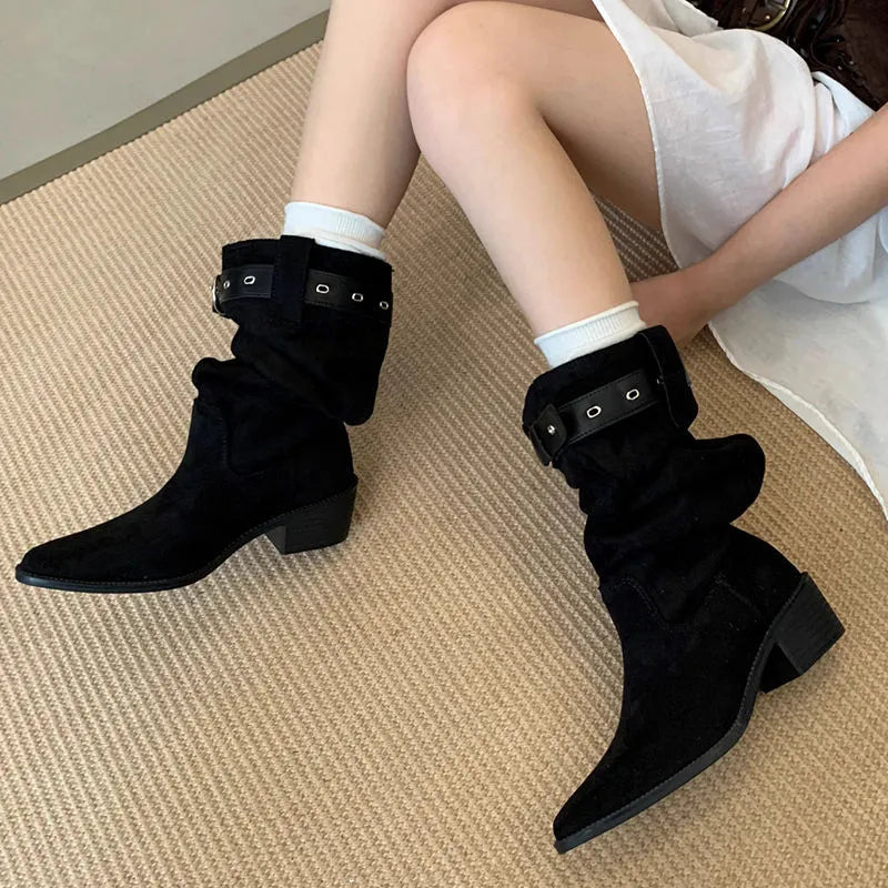 Western cowboy mid-calf boots with chunky heel and pointed toe in black