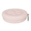 Collapsed and expanded views of a light pink and green portable silicone dog bowl.