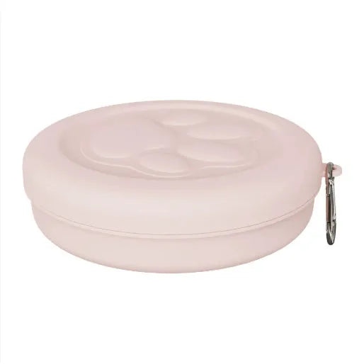 Collapsed and expanded views of a light pink and green portable silicone dog bowl.