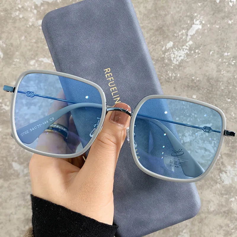 Photochromic myopia glasses with large frame, anti-blue light lens, available in four black gold frame colours