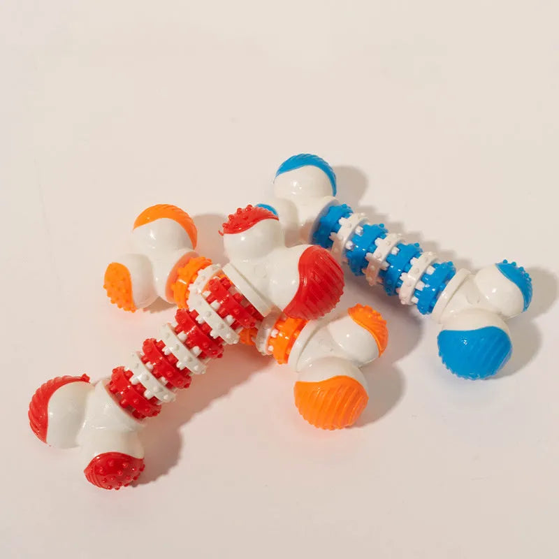 Blue bone-shaped rubber dog toy with treat hole for small breeds on a white background.