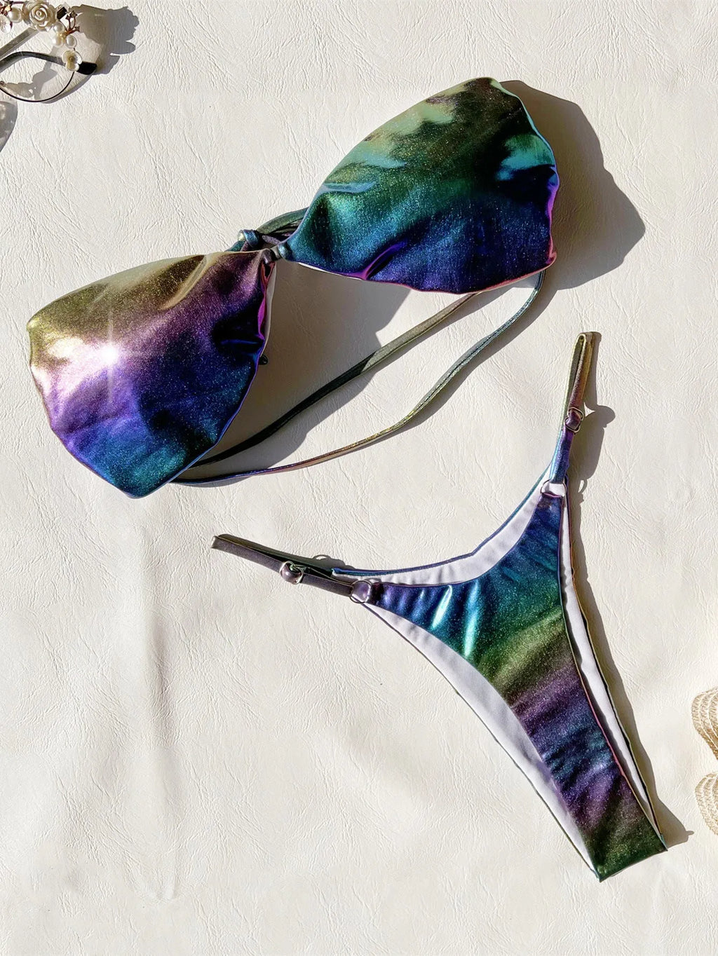 Women's purple gradient bikini swimsuit set on a white background