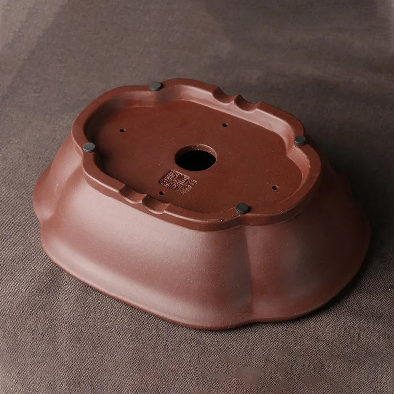 Handmade purple clay Chinese style bonsai pot measuring 25 cm long by 20 cm wide.
