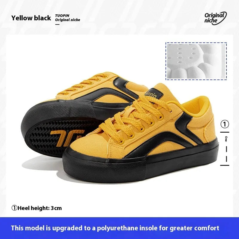 Women's low-top lace-up board shoes in synthetic leather with a vulcanised rubber sole, shown in a two-tone colour option.
