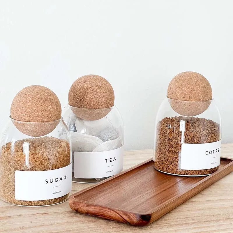 Set of three transparent spherical glass storage tanks with round single-layer design for general food storage