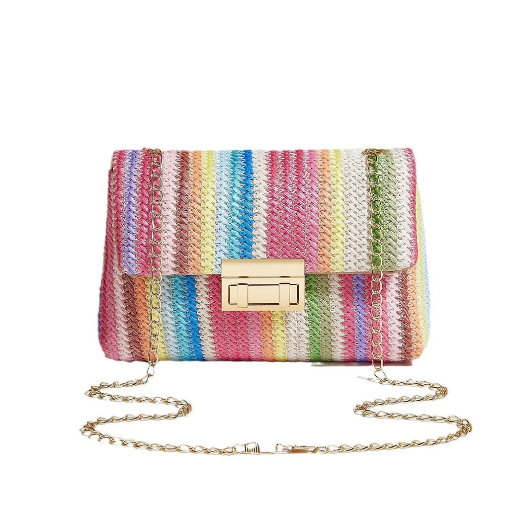 Women's straw cross-body bag with lock detail in rainbow colour showing square shape