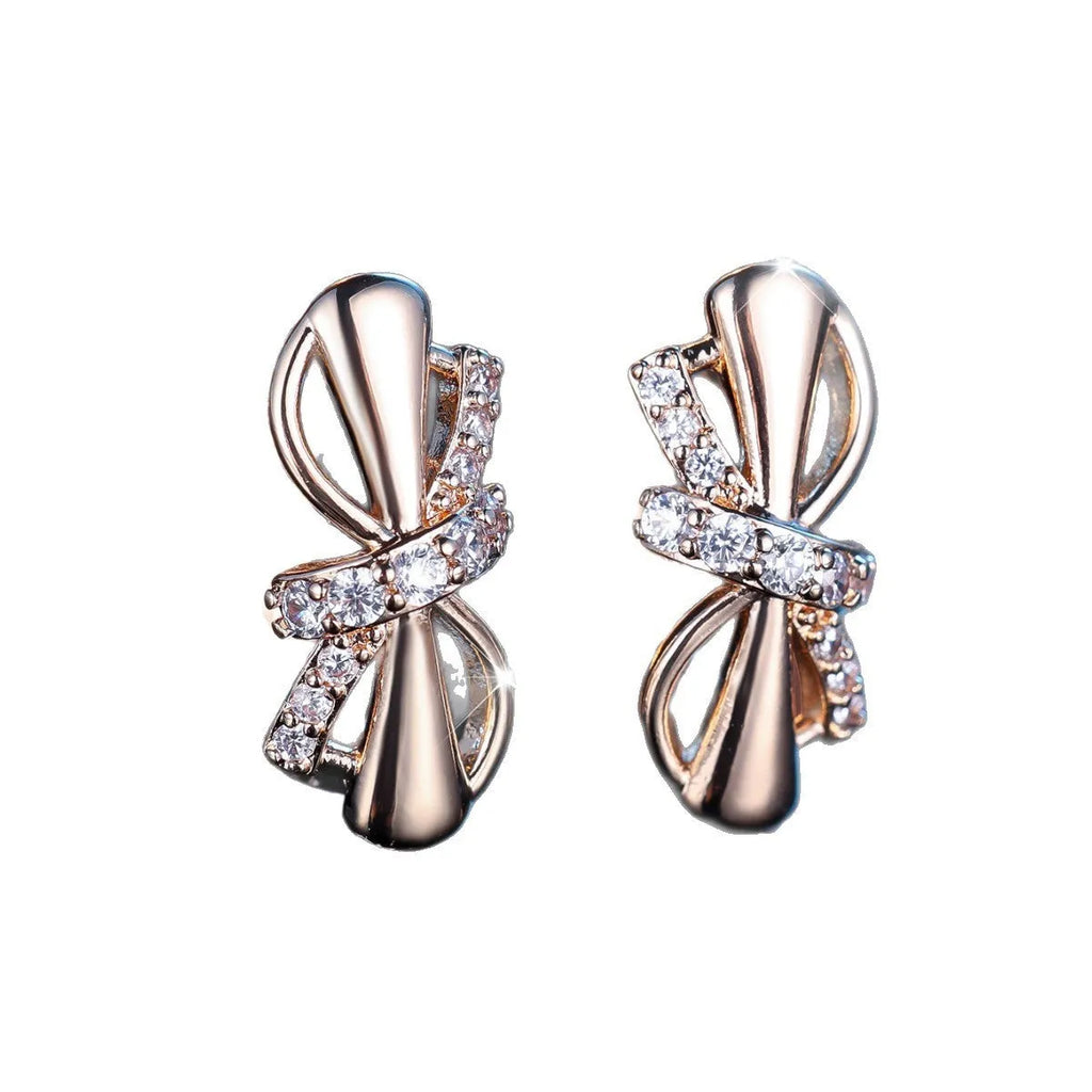 Champagne gold copper ear clip with white diamonds in fine bends and hitches design for women