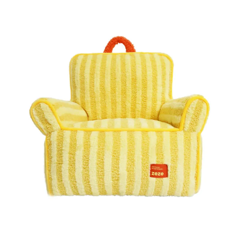 Striped orange plush pet bed for a small dog on a wooden floor.