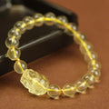 Yellow leather Pi Xiu bracelet with artificial crystal beads in Chinese simple national style