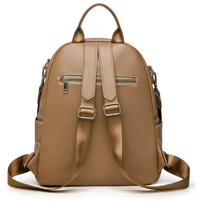 Genuine leather hand-held tassel backpack in khaki with stitching and fringe detail