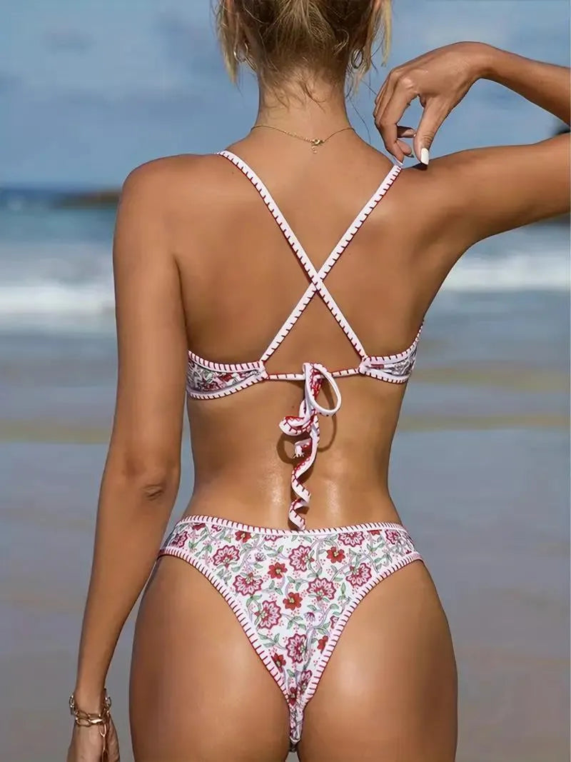 Women's floral print one-piece swimsuit with V-neck and embroidery detail