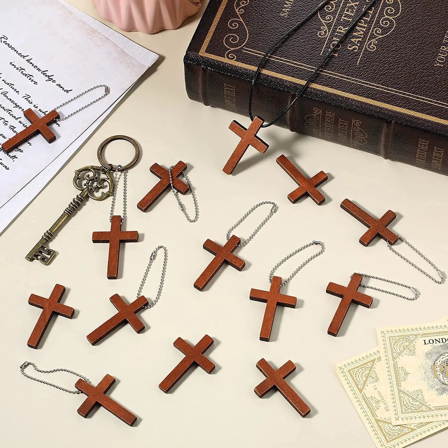 Wooden craft cross pendant ornament with natural wood finish, standing upright on a table