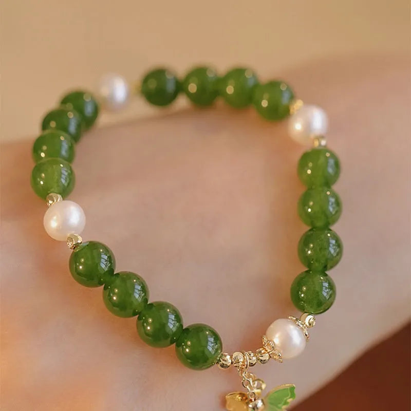 Green chalcedony bracelet with geometric design and round beads for women